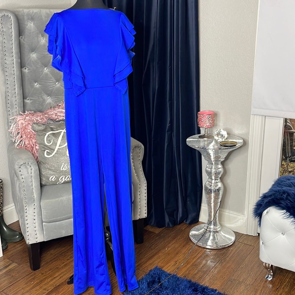 Royal blue ruffle shoulder jumpsuit stretch material size large